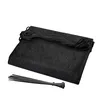 A black privacy screen for a balcony or fence, folded and bundled with ropes and ties, on a white background. Podgląd zdjęcia produktu