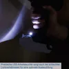 A hand holding a cordless drill with an LED light illuminating the area. Produktbild-Vorschau