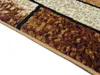 A close-up view of the edge of a rug with a brick-like pattern. Náhled obrázku produktu