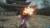 A character in a video game is using a weapon that shoots fire in front of a traditional building. Náhľad obrázku produktu