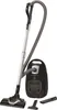 A black and silver vacuum cleaner with its accessories, displayed on a white background. Produktbild-Vorschau