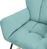 A close-up view of a teal upholstered rocking chair. Produktbild-Vorschau