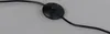 A close-up of a black foot switch and power cord for a lamp. Produktbild-Vorschau