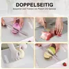 A collage of four images showing different uses of a stainless steel cutting board: slicing an onion, cutting meat, kneading dough, and slicing an apple. Text overlays describe the product's features. Produktbild-Vorschau