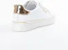 A white Guess sneaker with gold accents is shown against a white background. Produktbild-Vorschau