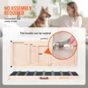 A dog and a person are in the background, while a wooden dog ramp is shown in the foreground with a close-up of a locking buckle. Produktbild-Vorschau