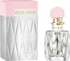 A product shot of Miu Miu Fleur D'Argent Absolue Eau de Parfum for women, with its packaging on the left and the bottle on the right. Anteprima dell’immagine prodotto