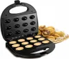 A black waffle maker with a basket of baked goods next to it. Anteprima dell’immagine prodotto
