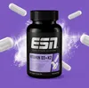 A bottle of ESN Vitamin D3+K2 supplements is shown with several capsules floating around it against a purple background with powder effects. Produktbild-Vorschau