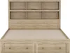 A kingsize platform bed with drawers and a bookshelf headboard, shown from the front. Produktbild-Vorschau