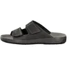 A side view of a black sandal with two adjustable straps. Anteprima dell’immagine prodotto