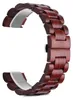 A close-up shot of a wooden watch band. Náhled obrázku produktu