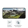 A smartphone screen displaying a mountain landscape, with two icons and text below. Náhľad obrázku produktu
