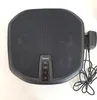 A black Beurer foot massager with a power cord and adapter. Produktbild-Vorschau