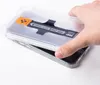 A hand is shown placing a clear plastic guide over a smartphone screen, indicating a step in applying a screen protector. Produktbild-Vorschau