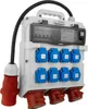 A white electrical distribution box with multiple outlets and a power cord. Produktbild-Vorschau