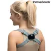 A woman wearing a posture trainer device on her back. Podgląd zdjęcia produktu
