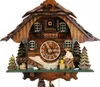 A traditional wooden cuckoo clock with intricate carvings and animated figures. Anteprima dell’immagine prodotto
