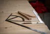 Carpentry tools laid out on a wooden surface. Anteprima dell’immagine prodotto