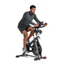 A man is riding an indoor cycling bike. Produktbild-Vorschau