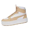 A studio shot of a single Puma Karmen Rebelle Mid sneaker. Produktbild-Vorschau