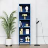 A dark blue bookshelf filled with decorative items and books, next to a large potted plant and a floor lamp. Anteprima dell’immagine prodotto