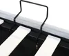 A close-up view of a bed frame's support structure, showing the metal frame and wooden slats with plastic caps. Produktbild-Vorschau