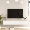 A modern TV stand with a wall-mounted television above it, in a minimalist room setting. Náhled obrázku produktu