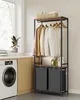 A laundry room scene featuring a washing machine and a multi-functional laundry rack with clothes hanging and storage bins. Produktbild-Vorschau