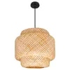 A pendant light with a woven bamboo shade and a black cord and ceiling mount, isolated on a white background. Náhled obrázku produktu