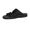 A black sandal is shown against a white background. Anteprima dell’immagine prodotto