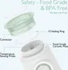 An exploded view diagram of a portable bottle warmer, highlighting its components and safety features. Náhľad obrázku produktu