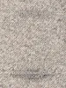 A close-up texture shot of a carpet with text overlays. Voir les images du produit