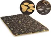 A quilted pet mat with paw print and bone patterns. Náhled obrázku produktu