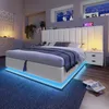 A modern bedroom with a white upholstered bed featuring LED lighting. Produktbild-Vorschau