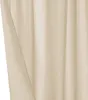 A close-up view of a beige curtain, showing its texture and folds. Produktbild-Vorschau