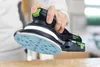 A person is holding and using a Festool sander on a wooden surface. Voir les images du produit