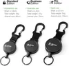 Three different retractable key holders are displayed side-by-side, each with descriptive text above them. Produktbild-Vorschau