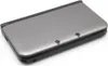 A closed Nintendo 3DS XL handheld game console is shown from a slightly elevated angle against a white background. Produktbild-Vorschau