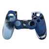 A blue camouflage silicone controller skin for a Sony PS4 controller is shown against a white background. Produktbild-Vorschau
