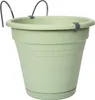 A light green hanging planter pot with gray hooks, shown against a white background. Náhľad obrázku produktu