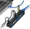 A USB hub connected to a laptop, with several USB drives plugged into it. Produktbild-Vorschau