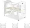 A main image of a white baby crib with three smaller images of the same crib below it. Produktbild-Vorschau