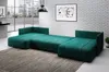 A teal sectional sofa is shown in a modern living room setting with a brick wall and large windows. Produktbild-Vorschau
