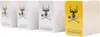A row of four card game boxes, three white and one yellow, against a white background. Produktbild-Vorschau