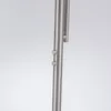 A close-up view of a brushed metal pole with two small buttons and a part of a fixture at the top. Produktbild-Vorschau