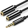 A close-up studio shot of a Ugreen audio splitter cable against a white background. Anteprima dell’immagine prodotto