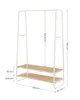 A white metal garment rack with two wooden shelves, shown with dimensions indicated by measurements and lines. Náhled obrázku produktu
