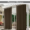 Outdoor curtains hanging on a pergola over a patio with furniture. Produktbild-Vorschau