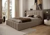 A bedroom scene featuring a bed, bedside table, and artwork. Náhled obrázku produktu